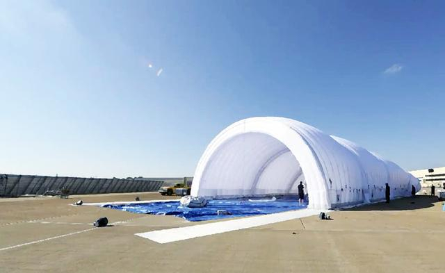 国产新一代充气式机库:几个小时就能修建一座野战机场_新浪新闻