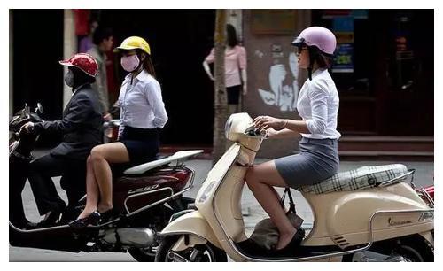 越南当地的女孩，为什么大多侧身乘坐摩托车，而不是跨着坐？