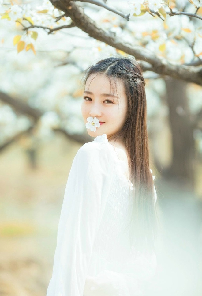 花环美女樱花园俏皮可爱靓丽唯美写真