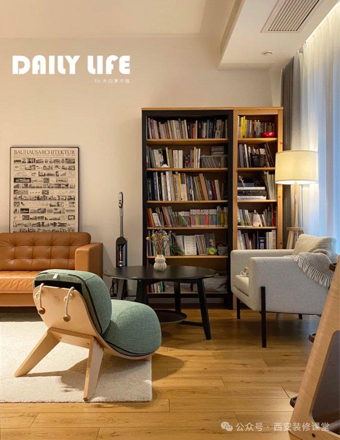 的阅读角落一个人独居就可以完全去客厅化布局,一面墙的书架满足藏书