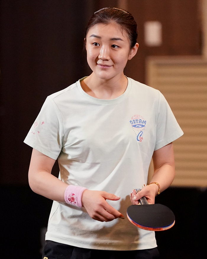 训练中的笑容樊振东陈梦张本美和邱党
