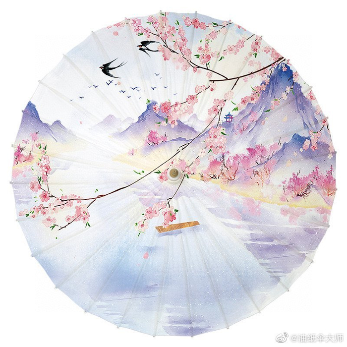 油纸伞是世界上最早的雨伞,纯手工制成