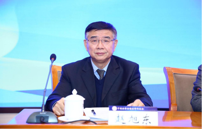政法大学教授赵旭东主持,全国人大常委会法制工作委员会副主任王瑞贺