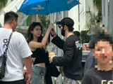 黄晓明被曝与女子同游新加坡，两人共撑一把伞，女方神似Angelababy