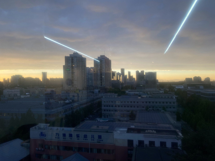 北京的落日跟世界末日似的… n个同事n个手机拍了n种末日