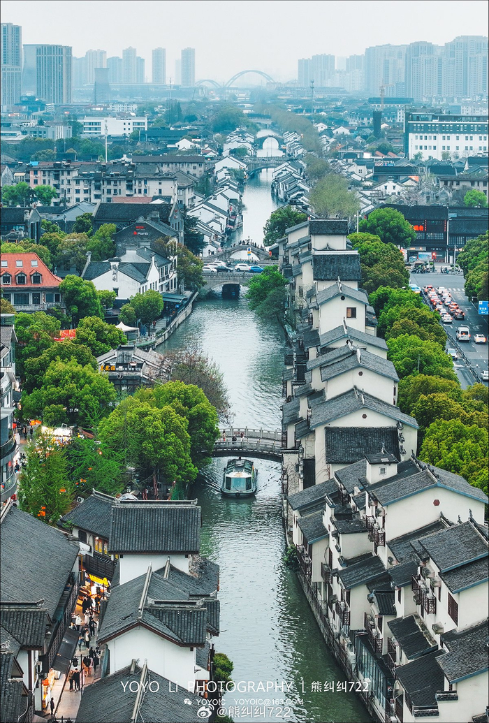 江南好风景旧曾谙日出江花红胜火春来江水绿如蓝新浪江苏旅游