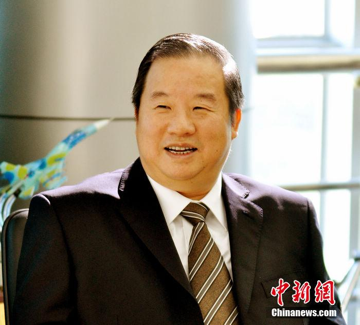 新华联集团董事局主席傅军