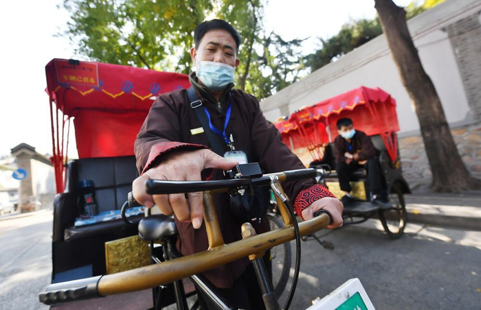 部分三轮车改装了刹车装置，更加静音。新京报记者 李木易 摄