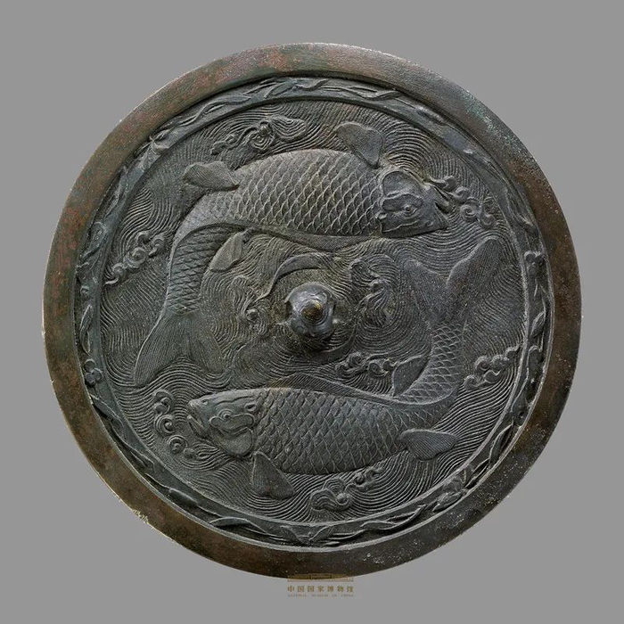 金代海水双鱼纹铜镜