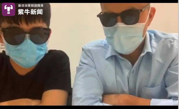 郎某和何某拍摄道歉视频的截图