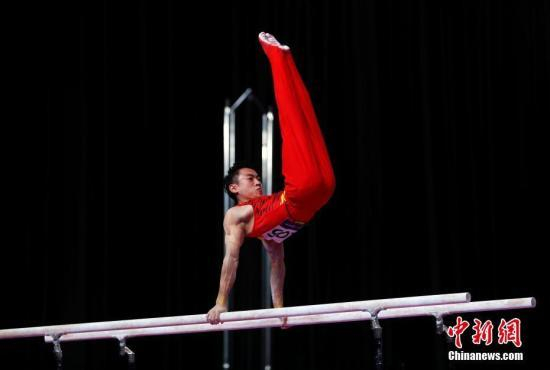 资料图：中国选手邹敬园在雅加达亚运会的比赛中。中新社记者 刘关关 摄