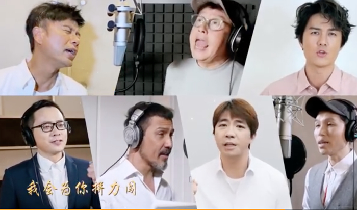 众人演唱粤语版《白衣长城》。图片来自网络