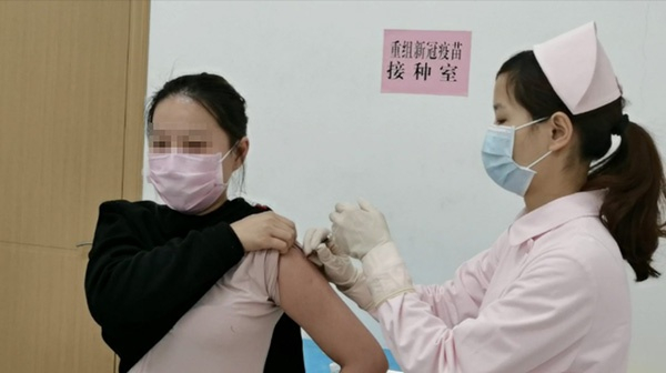  武汉志愿者接种重组新冠疫苗 受访者供图