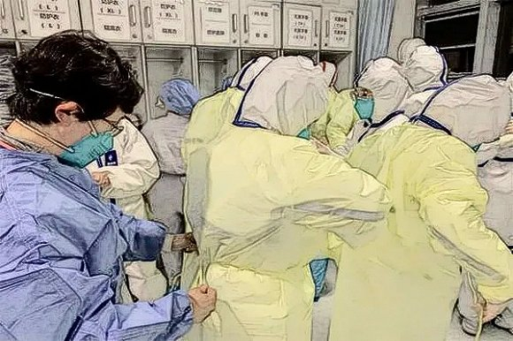 乔杰（左）为医护人员穿防护服。北京大学第三医院供图