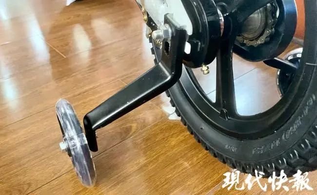 △一款儿童自行车存在平衡轮进行纵向负荷试验时变形量超标