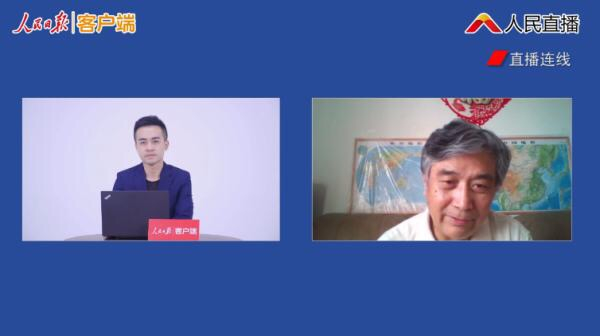 曾光（右）13日接受人民日报客户端谈北京疫情防控相关话题视频截图。