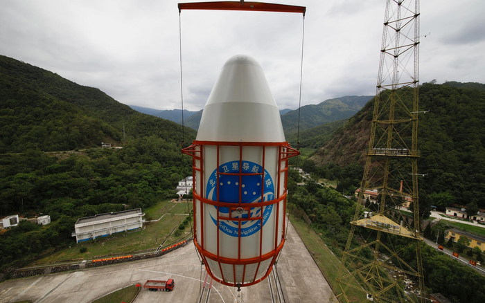 西昌卫星发射中心，北斗三号最后一颗组网卫星包裹在火箭整流罩中。航天科技集团一院供图