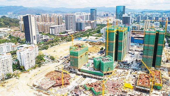 俯瞰加速建设中的三亚中央商务区。图片来源：海南日报