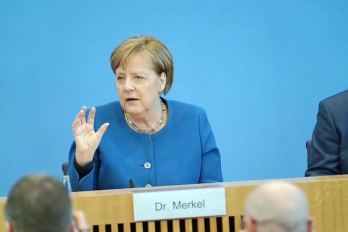 △德国总理默克尔3月11日在柏林出席介绍疫情应对的记者会。 中新社记者 彭大伟 摄