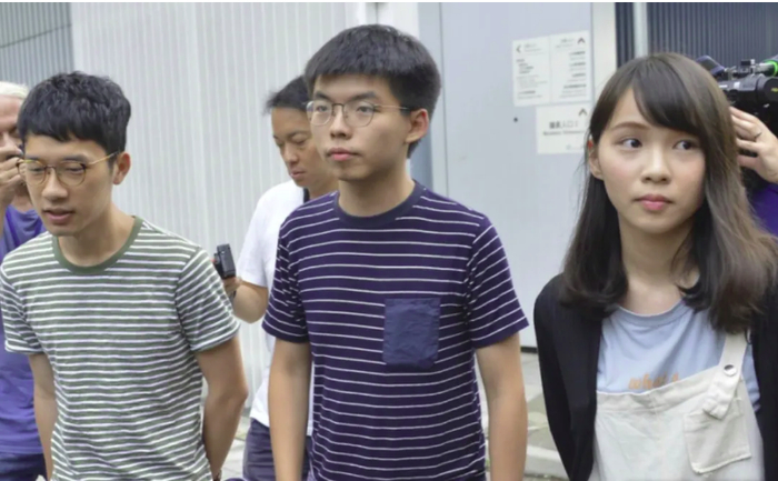  罗冠聪（左）、黄之锋（中）和周庭 图源：头条日报