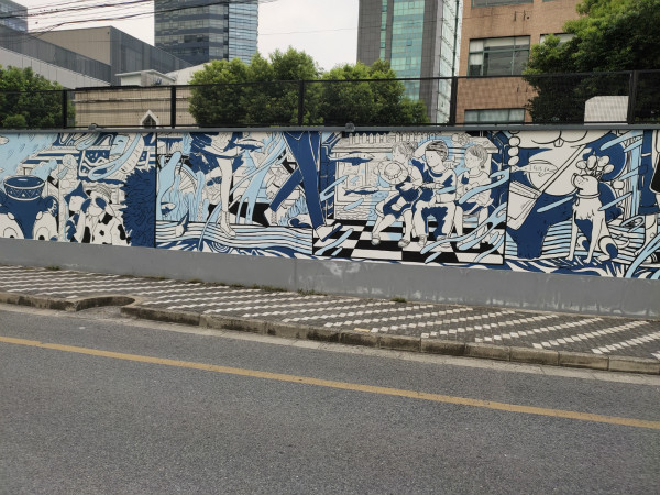 图说：反映水乡大都市市井生活故事的墙绘。彭浦镇 供图