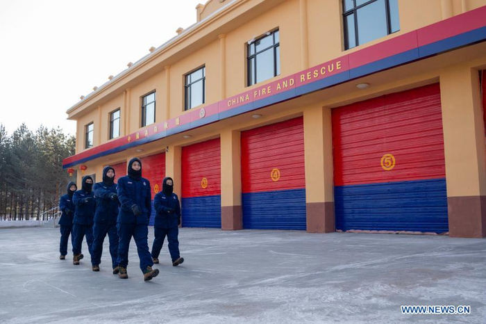Firefighters exercise at the fire station in Beiji Village of Mohe City, northeast China's Heilongjiang Province, Jan. 13, 2021. Firefighters stick to their post and keep training despite the freezing weather in Mohe, the northernmost city in China, where the temperature is often below minus 40 degrees Celsius in winter. (Xinhua/Xie Jianfei)