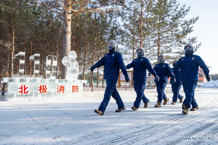 Firefighters exercise at the fire station in Beiji Village of Mohe City, northeast China's Heilongjiang Province, Jan. 13, 2021. Firefighters stick to their post and keep training despite the freezing weather in Mohe, the northernmost city in China, where the temperature is often below minus 40 degrees Celsius in winter. (Xinhua/Xie Jianfei)