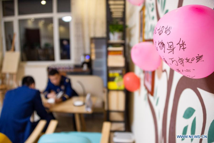 Firefighters read books in the activity room of the fire station in Beiji Village of Mohe City, northeast China's Heilongjiang Province, Jan. 13, 2021. Firefighters stick to their post and keep training despite the freezing weather in Mohe, the northernmost city in China, where the temperature is often below minus 40 degrees Celsius in winter. (Xinhua/Xie Jianfei)