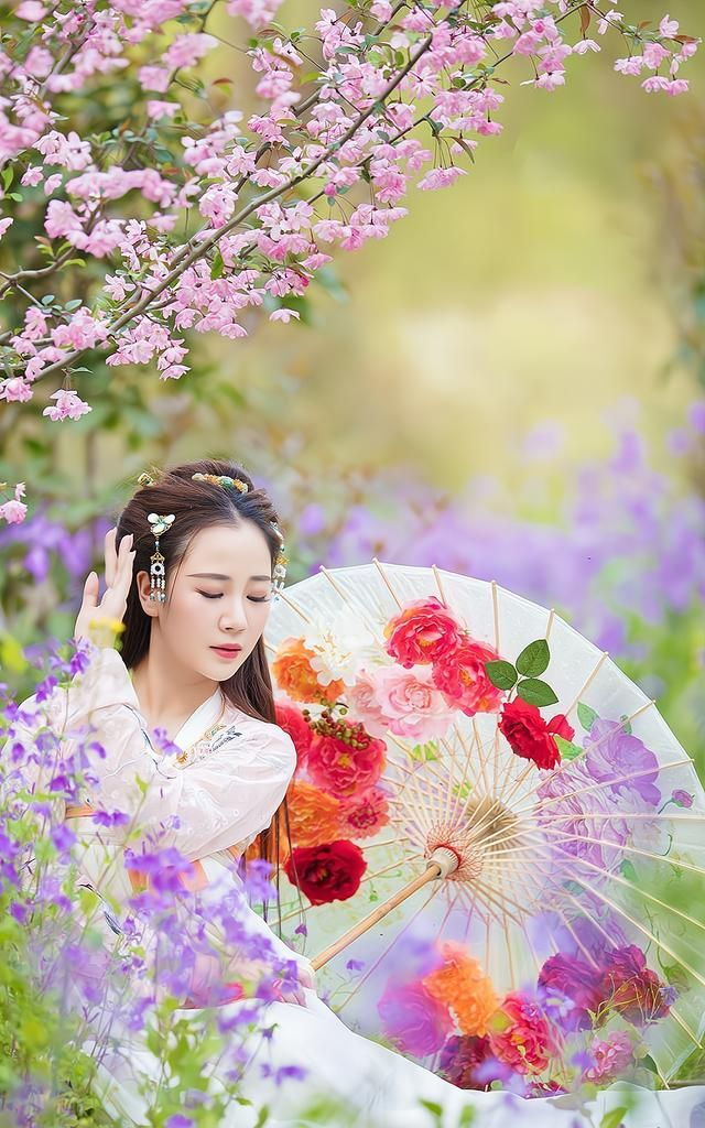 天空下,只想寻一抹微醉的花影,带着我一生的眷恋,飞入你的江南