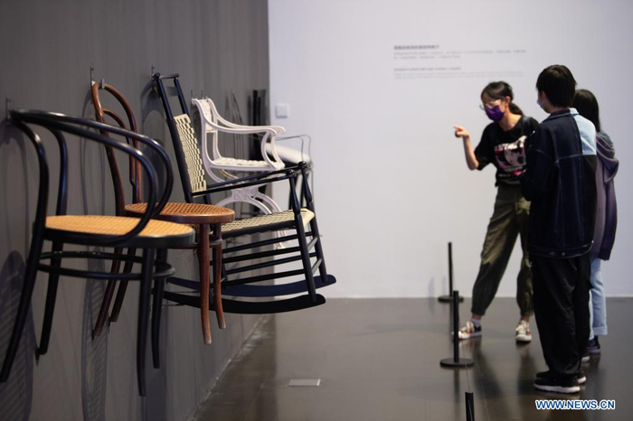 People visit an exhibition in Tsinghua University Art Museum in Beijing, capital of China, June 3, 2021. Displaying a total of 158 modern designs, the exhibition named 