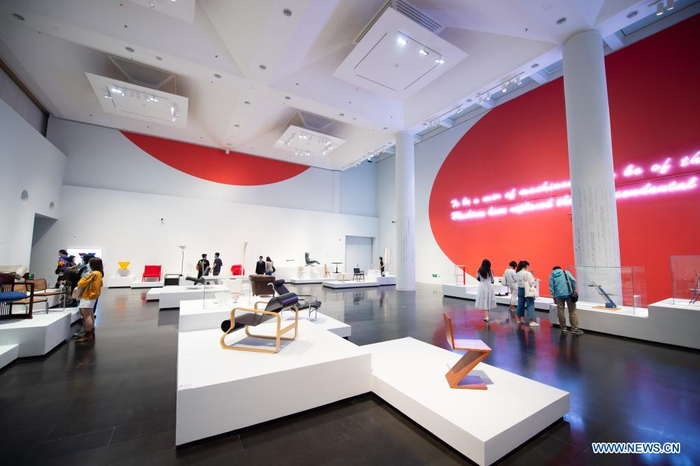 People visit an exhibition in Tsinghua University Art Museum in Beijing, capital of China, June 3, 2021. Displaying a total of 158 modern designs, the exhibition named 