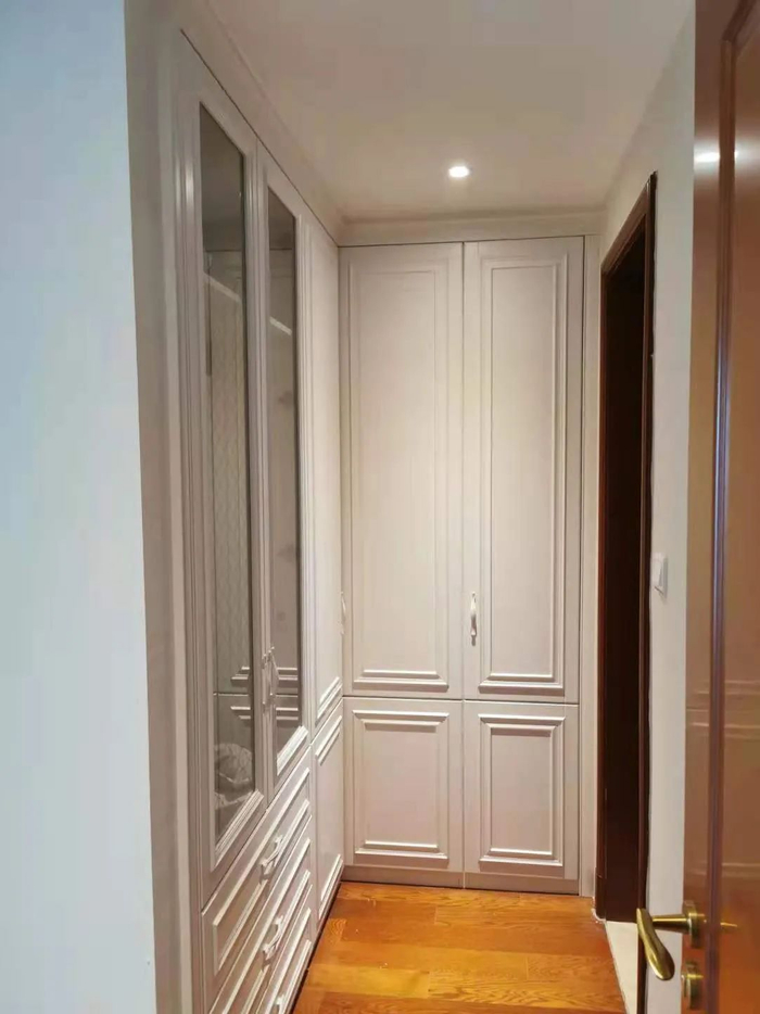 衣帽间柜子完工图（图片由欧派衣柜门店负责人提供）