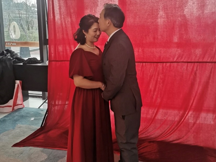 唐女士与先生参加“七夕拍摄夫妻照”活动（央广网发 重庆碧桂园供图）