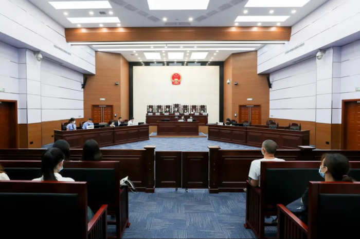 开庭审理现场 市市场监管局供图