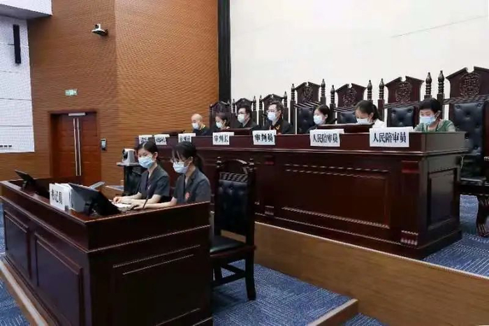 开庭审理现场 市市场监管局供图