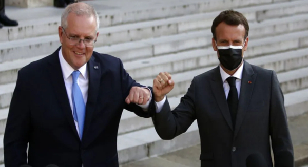 图说：莫里森（左）和马克龙。图源：GJ