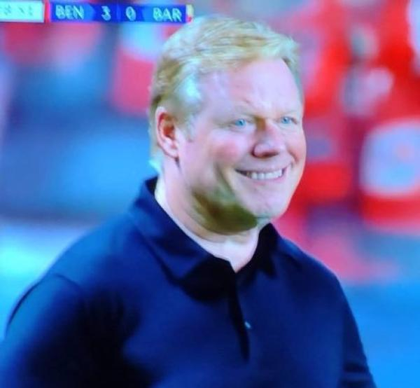 科曼居然笑了起来。