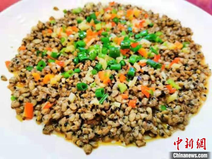 蒸米蚬肉 李晓春 摄