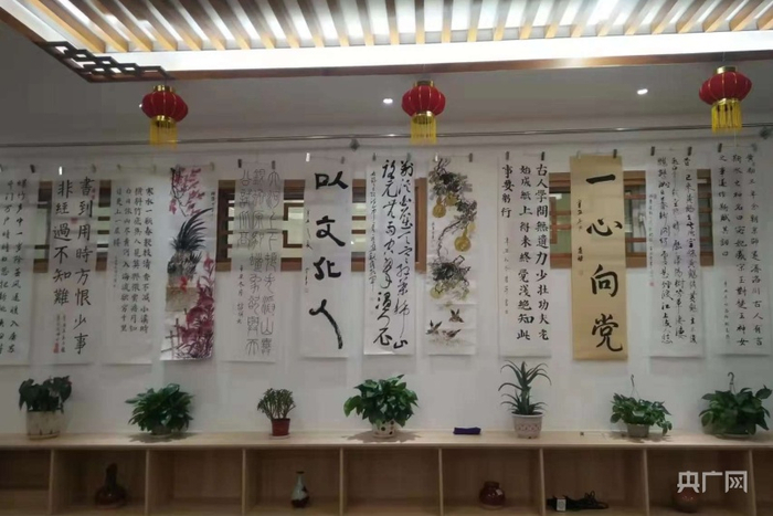 春联书画送温暖活动现场。央广网发