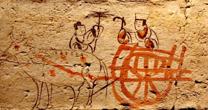 魏晋画像砖上的牛车图。