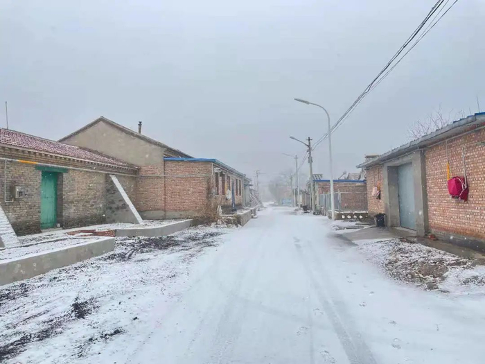 ▲1月25日，雪中的尹家河村。新京报记者 海阳 摄