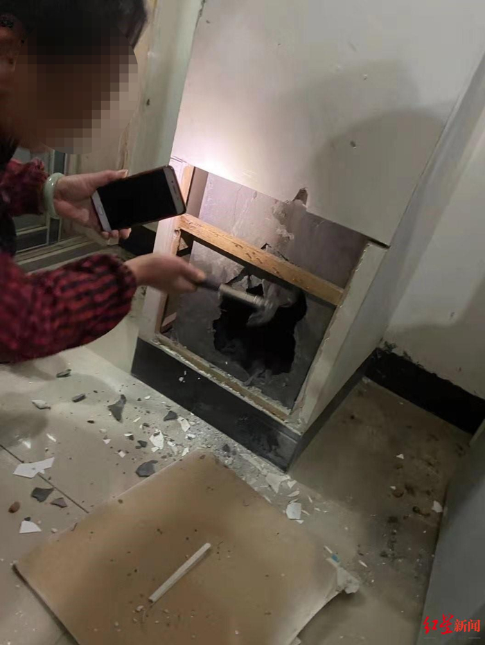 砸开烟道救猫咪