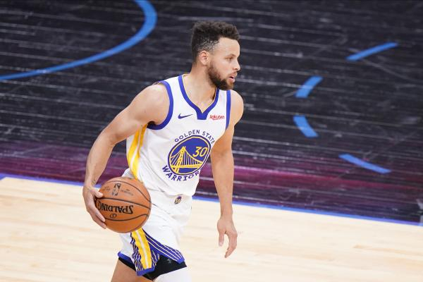 库里在比赛中 本文图片 CFP