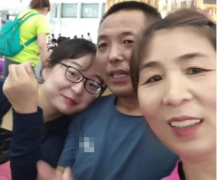 △苏女士和父母