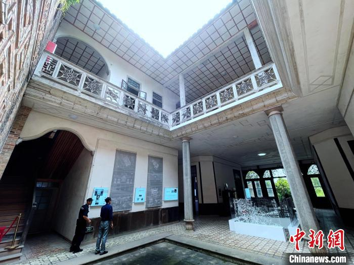 图为完成修复的采峰别墅。　张斌 摄