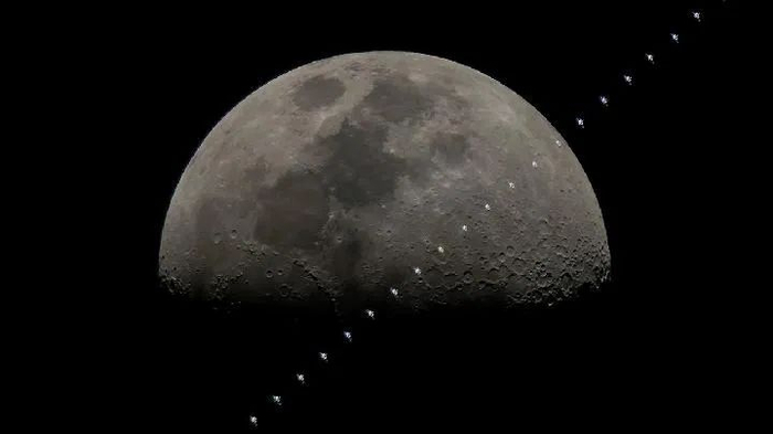 北京市天文爱好者郑志2018年3月25日在北京拍摄的ISS“凌月”照片（多张叠加）。（本人供图）