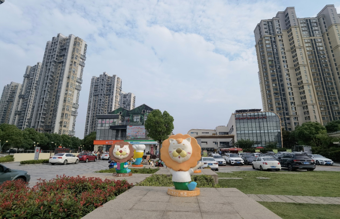 （白塘景苑小区外观 时代周报记者摄）