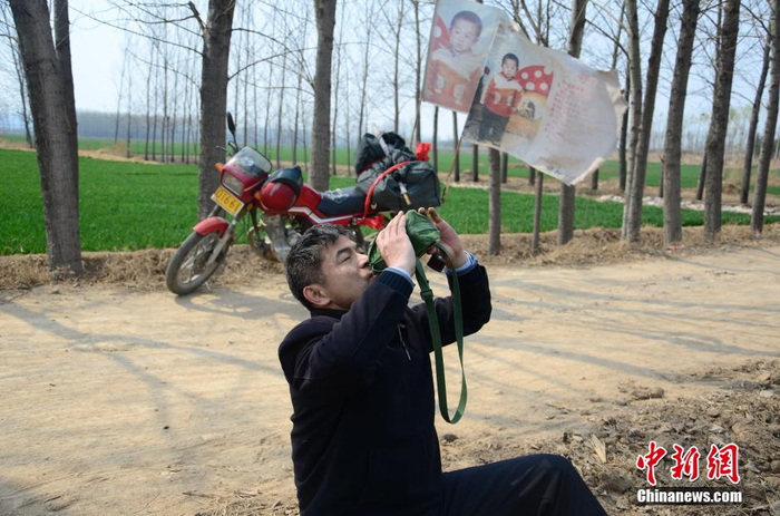 资料图：郭刚堂。中新社 韦鹏 摄