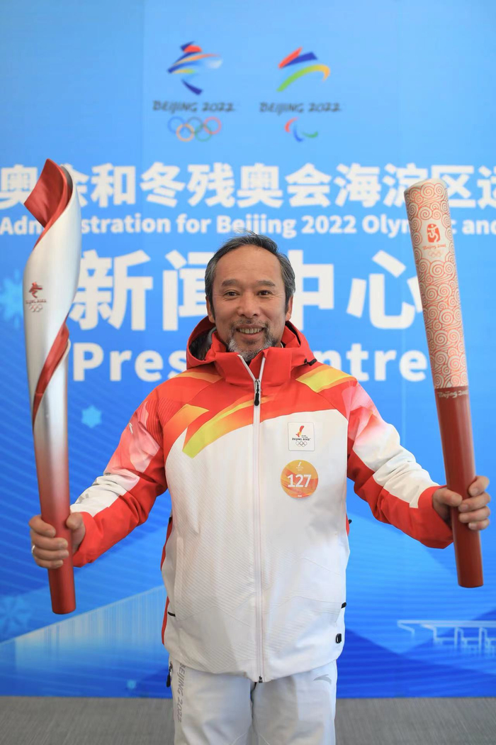 火炬手周晨光。新京报记者 浦峰 摄