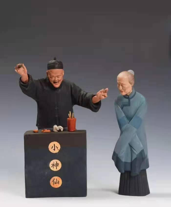 张华棠塑《算卦》